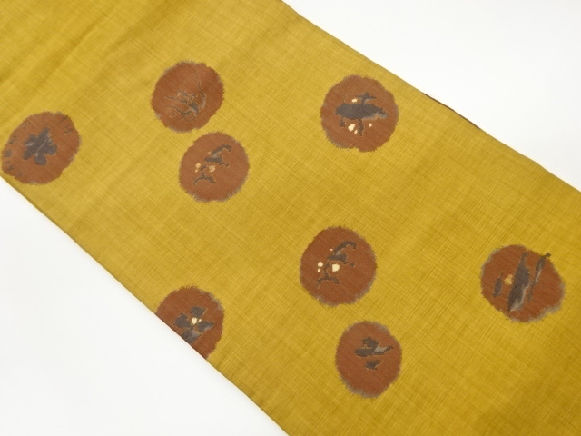 丸文に抽象模様織出し名古屋帯